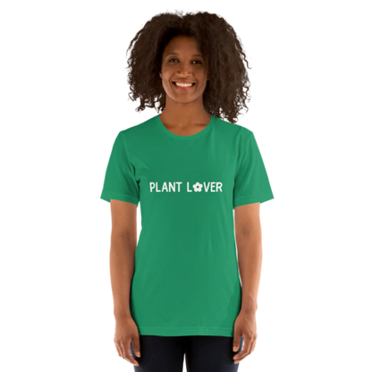 A person wearing a kelly green heather t-shirt by Less Hustle, More Joy, with the words 'PLANT LOVER' printed on the front in white text.