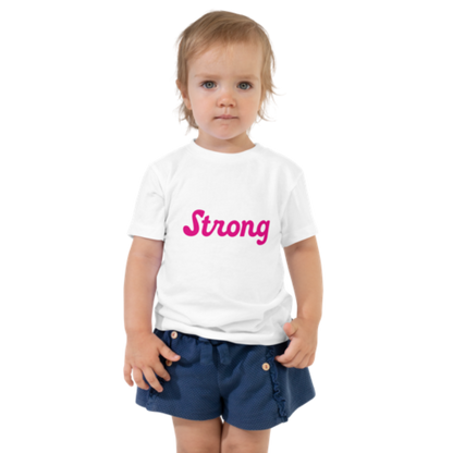 Front view of a white, short-sleeved toddler tee by Less Hustle, More Joy. The front features the word 'Strong' printed in punk rock pink text.