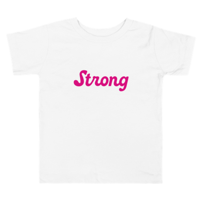 Image of a white, short-sleeved toddler tee by Less Hustle, More Joy. The front features the word 'Strong' printed in punk rock pink text.