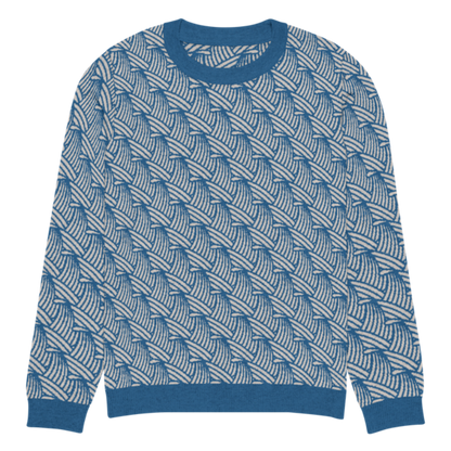 A lay-flat image of the front of a 2XL size crew-neck knitted sweater with a wave pattern in blue and sand colours by Less Hustle, More Joy.