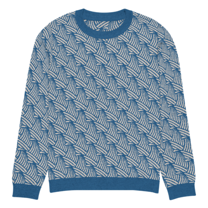A lay-flat image of the front of a 2XS crew-neck knitted sweater with a wave pattern in blue and sand colours by Less Hustle, More Joy.