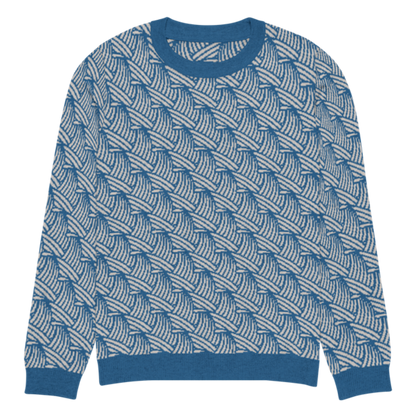 A lay-flat image of the front of a 3XS size crew-neck knitted sweater with a wave pattern in blue and sand colours by Less Hustle, More Joy.