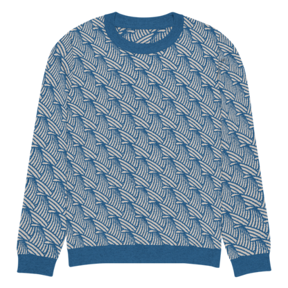 A lay-flat image of the front of a M size crew-neck knitted sweater with a wave pattern in blue and sand colours by Less Hustle, More Joy.