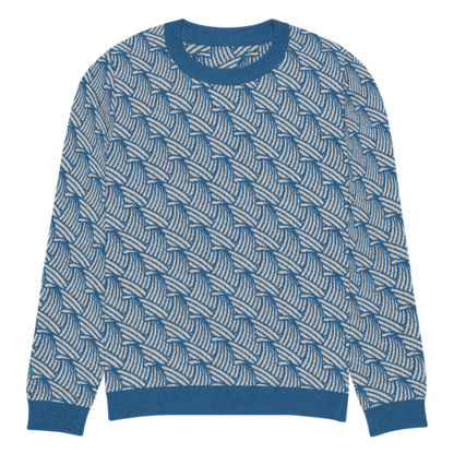 A lay-flat image of the front of a S size crew-neck knitted sweater with a wave pattern in blue and sand colours by Less Hustle, More Joy.