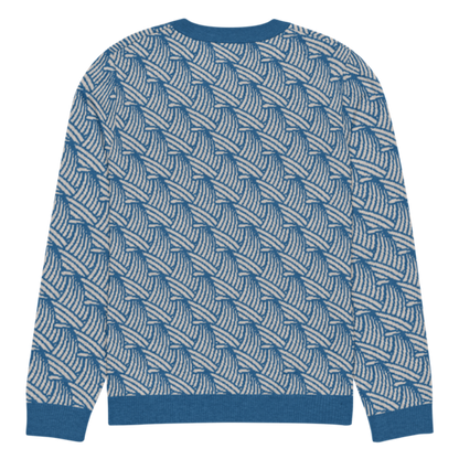 A lay-flat image of the back of a XS size crew-neck knitted sweater with a wave pattern in blue and sand colours by Less Hustle, More Joy.
