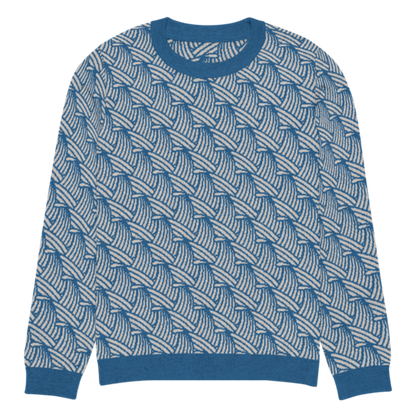 A lay-flat image of the front of a XS size crew-neck knitted sweater with a wave pattern in blue and sand colours by Less Hustle, More Joy.
